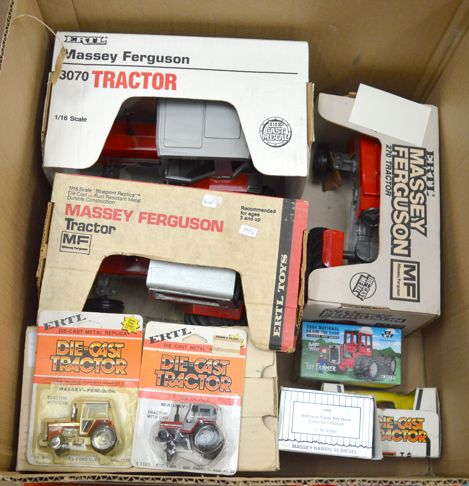 A good quantity of boxed agricultural diecast models mainly by ERTL, in vavrious different scales.