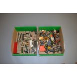 O gauge. A good selection of scenic accessories, loads, luggage, lamps, etc. Contained in two trays.
