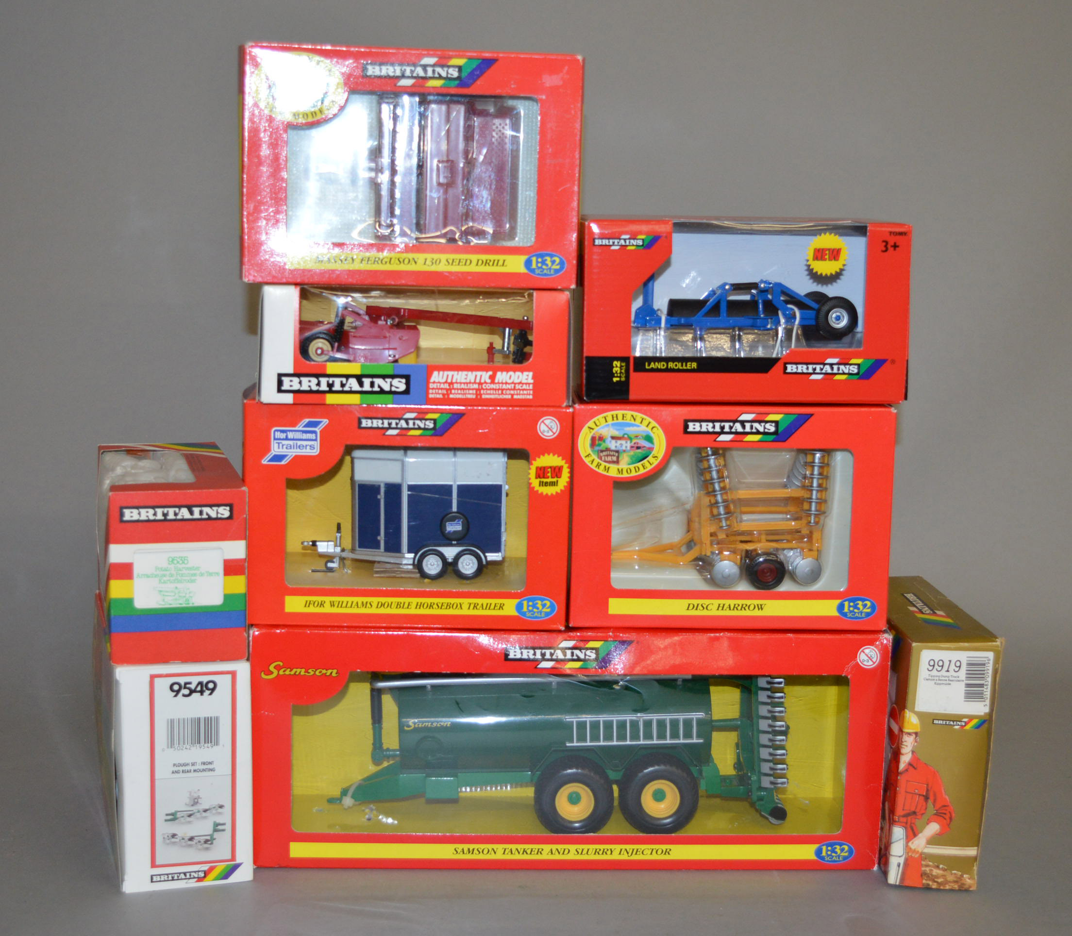 Nine Britains 1:32 scale diecast model farm and agricultural implements and accessories,