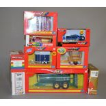 Nine Britains 1:32 scale diecast model farm and agricultural implements and accessories,