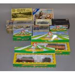 11 x Corgi diecast models: five Fairground Attractions 2001; six assorted military models.