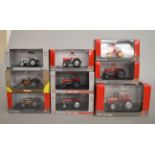 Nine boxed Universal Hobbies diecast model Massey Ferguson Tractors in 1:43 scale.