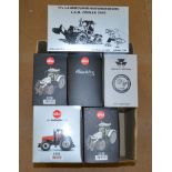 Seven boxed Universal Hobbies diecast model Massey Ferguson Tractors in 1:32 scale.