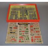 A glazed framed display of Meccano Aeroplane Constructor Set parts together with a 'Meccano Parts'