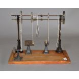 Selection of steam-related accessories mounted on a 45cm x 24cm base. Height 28cm.