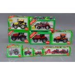 Nine Siku diecast model tractors: 1878; 1857; 3470; 3054; 3251; 2960; two 3051; 3555.