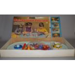 A boxed Corgi Toys 853 Magic Roundabout Playground set.