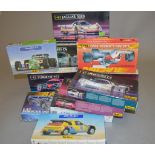 12 x Heller plastic model kits, all cars. Contents not checked but some sealed.