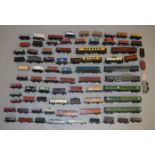OO gauge. Good quantity of unboxed rolling stock and coaches by Triang, Hornby, etc.