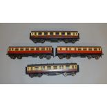 O gauge. Four coaches, two by Bassett-Lowke and two by Leeds Model Company. A/F.