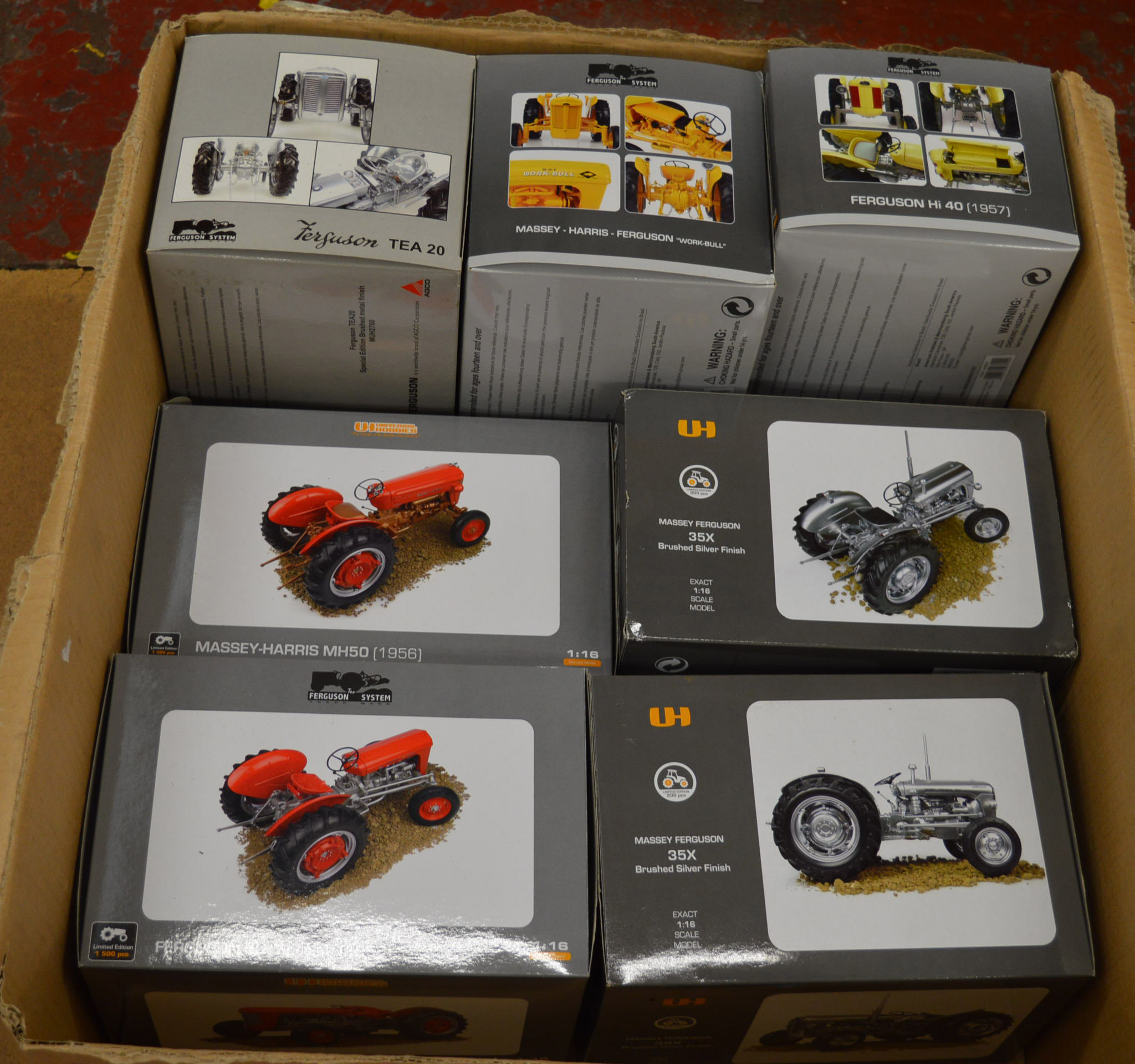 Seven Universal Hobbies 1:16 scale Massey Ferguson diecast model tractors. Boxed and E.