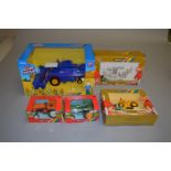 Five Britains diecast models: 9422 Tractor in orange; 9422 Tractor in green;