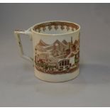 A late 19th century tankard nicely decorated with a steam train scene. 10.5cm tall.