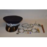 A collection of police memorabilia including a West Midlands Constable cap badge,