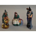 3 Royal Doulton figures: Silks And Ribbons HN2017, The Mask Seller HN2103, The Wizard HN2877.