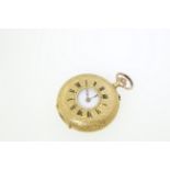 A continental top-wind pocket watch with enamelled floral decoration on it's reverse,