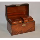 A mahogany veneer two compartment tea caddy.