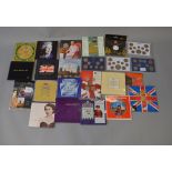 A boxed quantity of modern uncirculated UK coins in card covers,