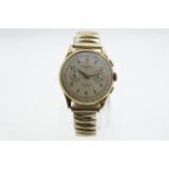 A 1950's manual wind 'Chronographe Suisse' wristwatch, the case marked 18k/750,