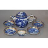 A 19th century teapot with 6 similar blue and white tea bowls and a cup (sd)