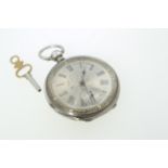 A Victorian silver cased key wind pocket watch with silver dial, stamped 'Fine Silver',