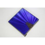 A silver & blue enamel cigarette case with marcasite set clasp & gilt interior, small corner chip,