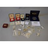 A small case containing Royal Mint silver crown 1977, Canada 1oz fine coin, silver proof £1,