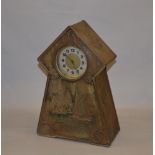 A tinplate repousse Victory V clock, some rusting.