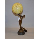 A bronzed Art Deco stye electic lamp, mid 20th century. 51cm tall.