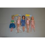 Three Pedigree Sindy dolls, two blonde and one brunette.