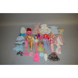 Quantity of fashion dolls: two Hasbro Jem dolls; Pedigree Sindy; two Mattel Barbie;