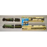 OO gauge. Two Wrenn locomotives: W2235 4-6-2 BR green 'Barnstaple'; W2211 4-6-2 BR green 'Mallard'.