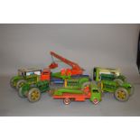 A quantity of mainly unboxed tinplate agricultural models including five Mettoy Tractors and two