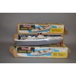 Seven boxed Tri-ang battery operated model ships,