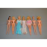 Seven Mattel Barbie dolls,