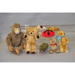 Eight assorted vintage teddy bears, including a Merrythought Monkey and a Merrythought Tortoise.