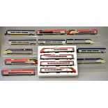 OO gauge. Four unboxed train packs: two Virgin Pendolino sets; two Eurostar sets.