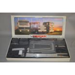 A boxed Wedico (Germany) stainless steel and aluminium 1:16 scale model Truck kit in black,