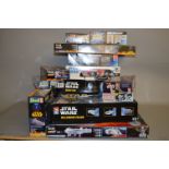 13 x Star Wars plastic model kits by AMT, Revell, etc. All boxed, not checked if complete.