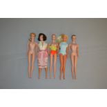 Five Mattel Barbie dolls: blonde Ponytail Barbie; Fashion Queen Barbie; Malibu Barbie; Midge;