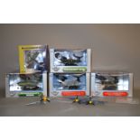 Five boxed diecast model aircraft: four Air Signature 1:48 scale; one Witty Wings.