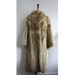 Vintage 1970s full length fox fur. Size 10-12. Great condition.