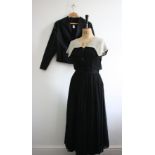 A vintage 1950s tafetta evening jacket and an early 1950s black dress with button front and cape