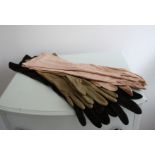 A set of 4 pairs of vintage 20s/30s long formal evening gloves.
