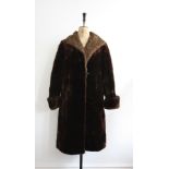 Vintage 1940s/50s chocolate brown beaver lamb ladies fur coat with an astrakhan collar.
