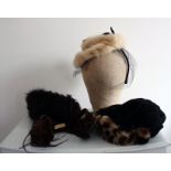 Four vintage hats that include a BBC costume 1930s wool and ocelot, a 1930s velvet and fur,