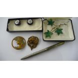A Parker sterling silver pen, a silver and enamelled brooch, pair of enamelled studs and 2 Art