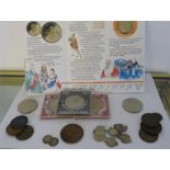 A small quantity of various coins including an American commemorative coin for the opening of the