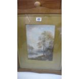 A watercolour of a wooded river scene signed T Newboulton