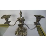 A silver plated three branch candleabra